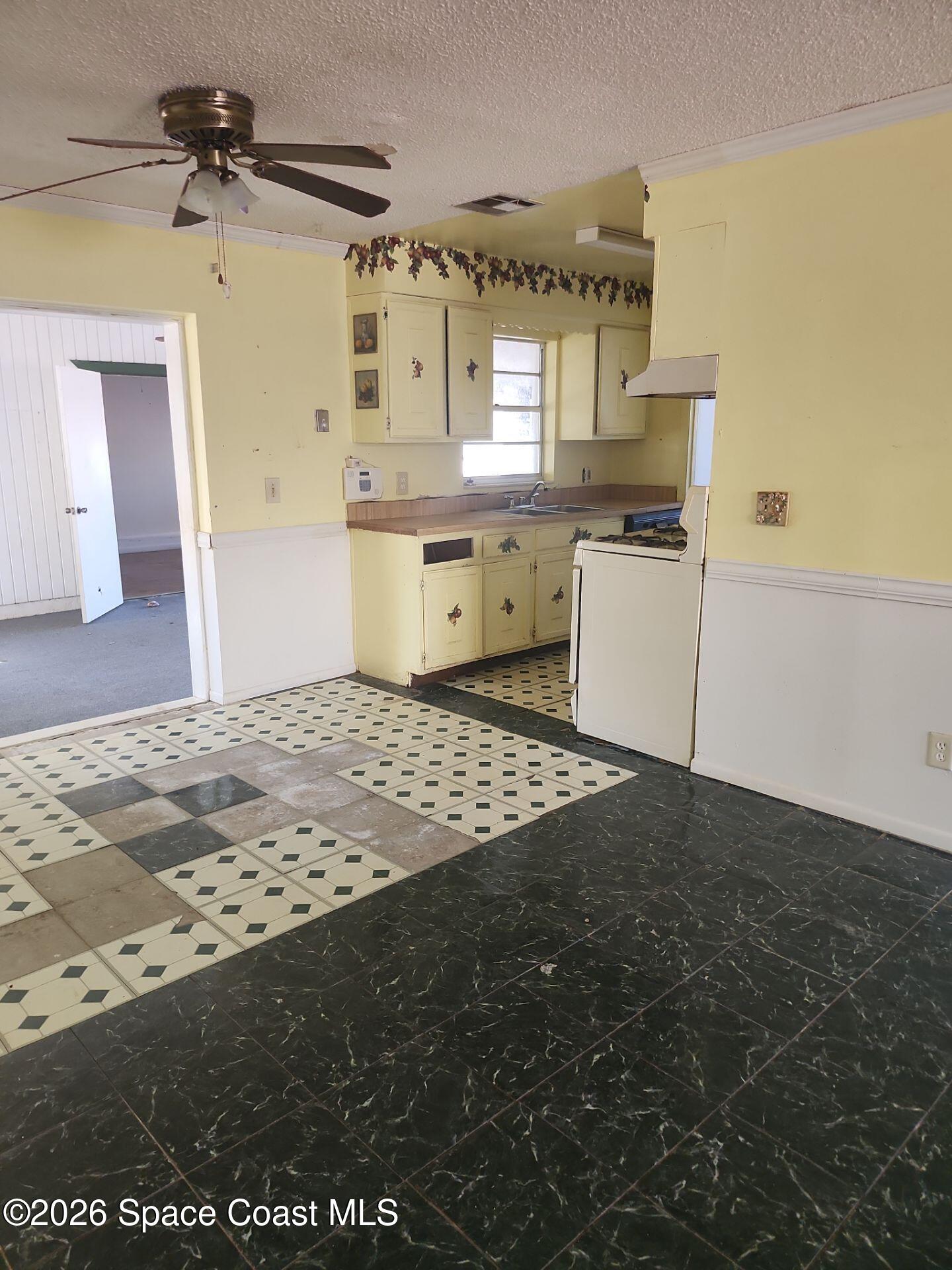 2972 Matthew Drive Rockledge, FL 32955 - Photo 4 of 24 a view of a kitchen with a sink