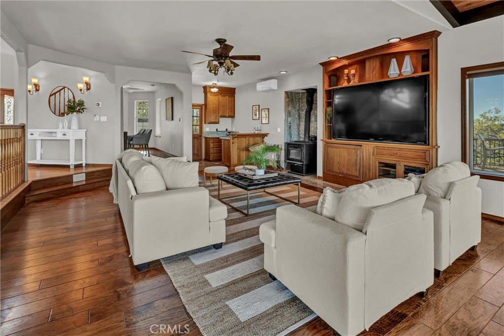 20250 Black Bass Pass Road Lower Lake, CA 95457 - Photo 18 of 66 a living room with furniture and a flat screen tv