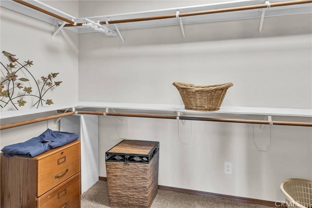 20250 Black Bass Pass Road Lower Lake, CA 95457 - Photo 31 of 66 a kitchen with a refrigerator and a stove top oven