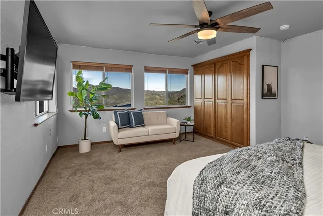 a kitchen with sink refrigerator and window