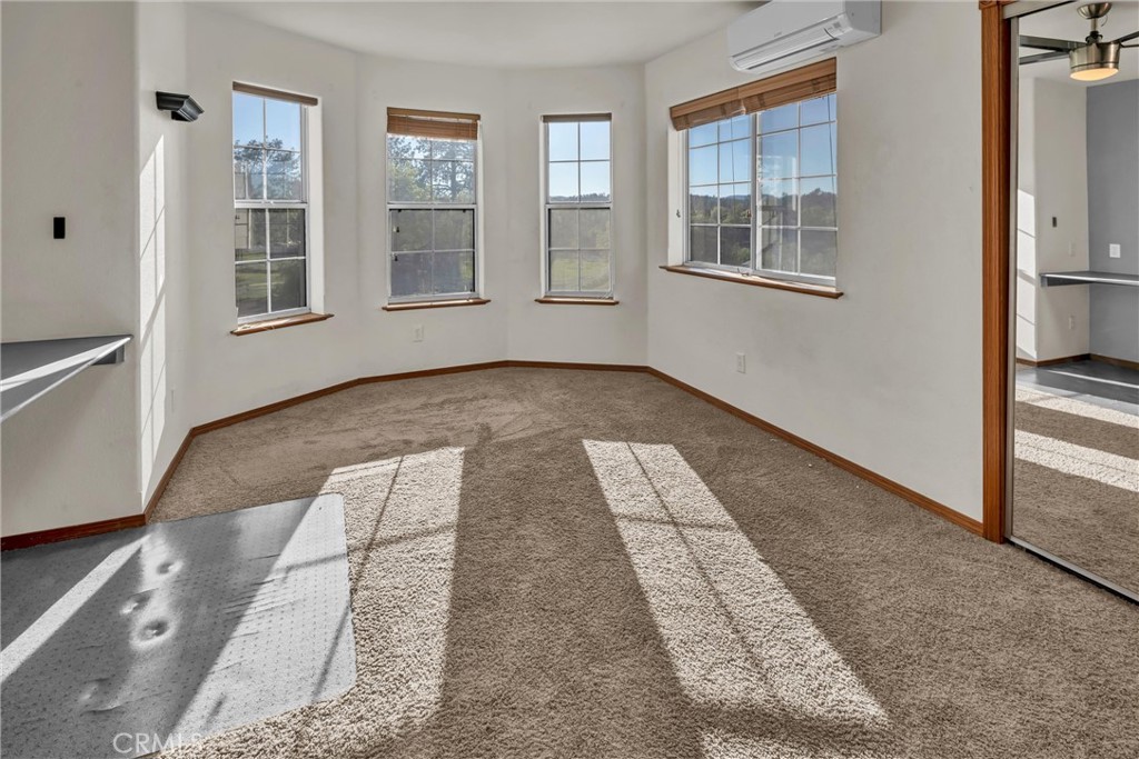 20250 Black Bass Pass Road Lower Lake, CA 95457 - Photo 41 of 66 a view of an empty room with windows