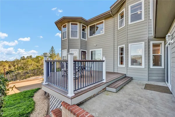 a view of a yard with an outdoor space
