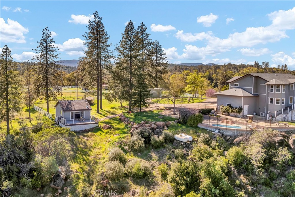 20250 Black Bass Pass Road Lower Lake, CA 95457 - Photo 48 of 66 a aerial view of a house with a yard basket ball court and outdoor seating