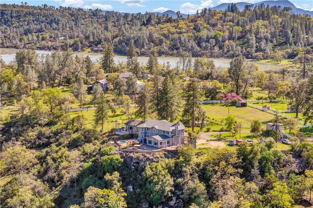 20250 Black Bass Pass Road Lower Lake, CA 95457 - Photo 5 of 66 an aerial view of residential building with outdoor space and lake view