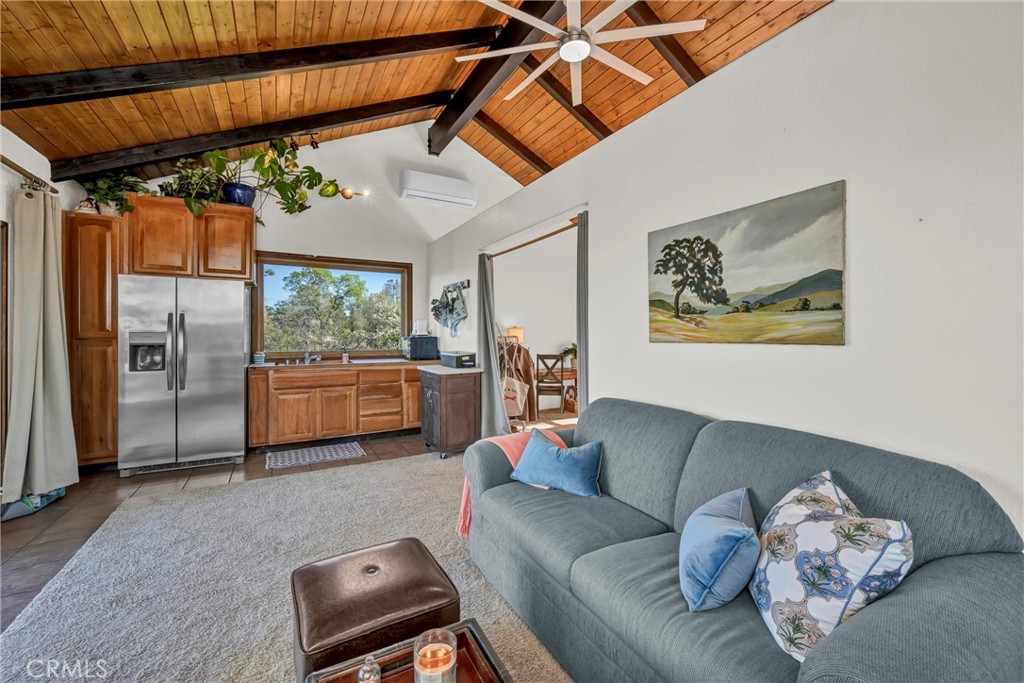 20250 Black Bass Pass Road Lower Lake, CA 95457 - Photo 52 of 66 a living room with furniture and a large window