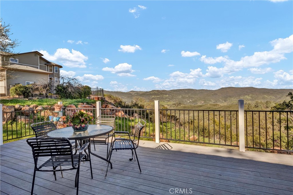 20250 Black Bass Pass Road Lower Lake, CA 95457 - Photo 56 of 66 a view of a terrace with furniture and wooden floor