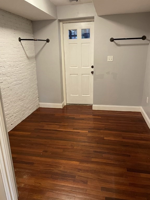 1 Wigglesworth Street, Unit 1 Boston, MA 02120 - Photo 19 of 39 a view of a room with wooden floor
