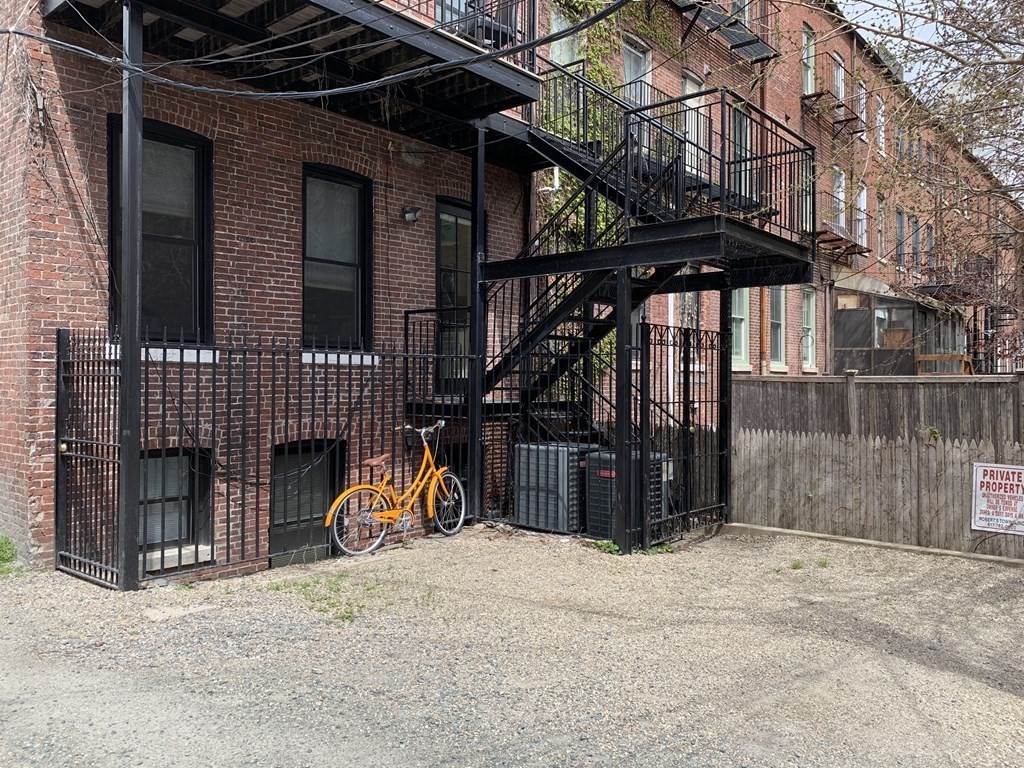 1 Wigglesworth Street, Unit 1 Boston, MA 02120 - Photo 22 of 39 a view of a house with a snow on the wall