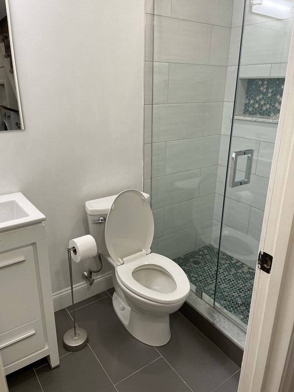 1 Wigglesworth Street, Unit 1 Boston, MA 02120 - Photo 8 of 39 a bathroom with a toilet and a shower