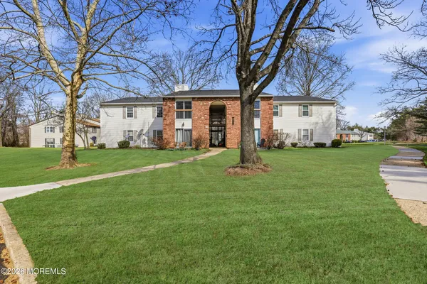 a view of a house with a big yard