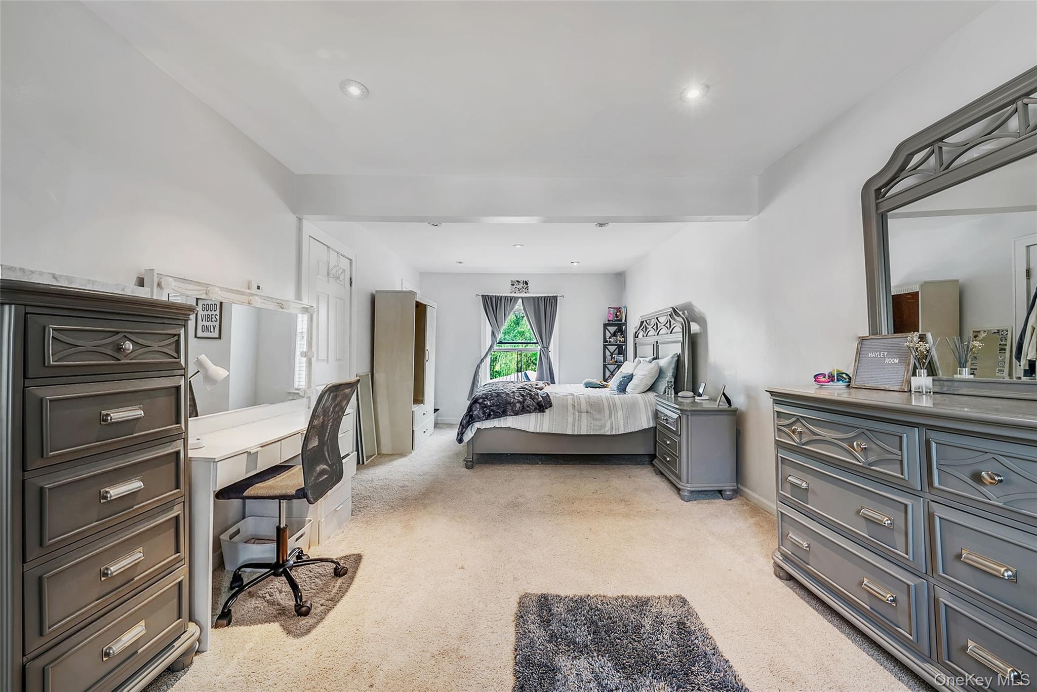 80 George Street Babylon, NY 11702 - Photo 29 of 41 a bedroom with furniture and a window