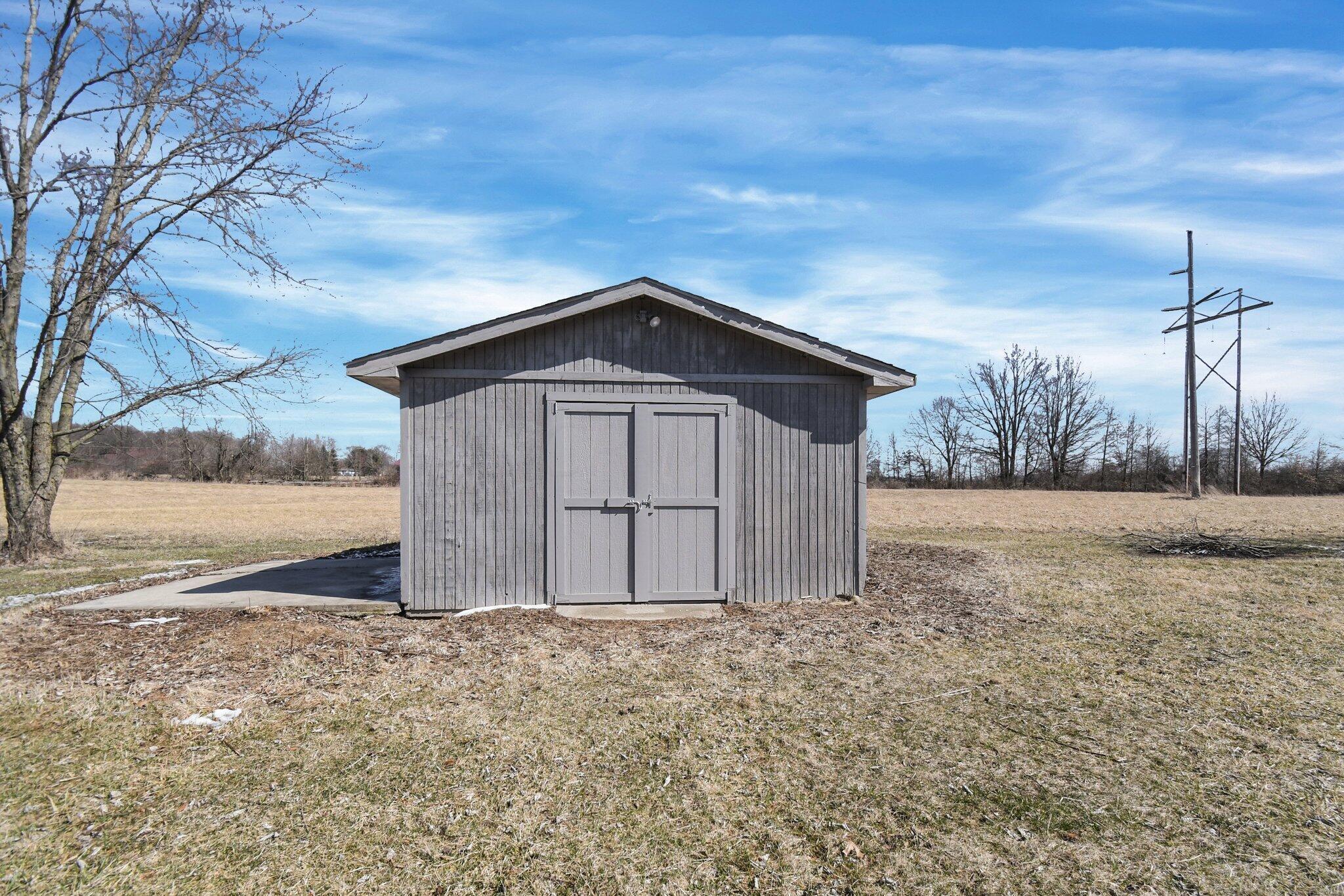 3975 Warrensburg Road Delaware, OH 43015 - Photo 26 of 42 Storage shed w/ concrete pad