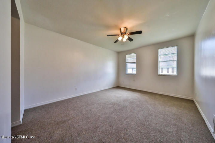 1713 El Camino Road, Unit 7 Jacksonville, FL 32216 - Photo 12 of 17 a view of empty room with windows