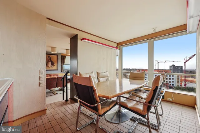a kitchen with stainless steel appliances granite countertop a stove and a refrigerator
