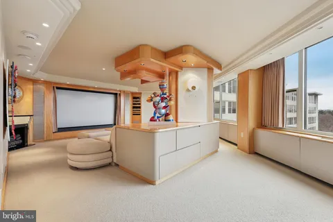 a spacious bedroom with a large bed and a balcony