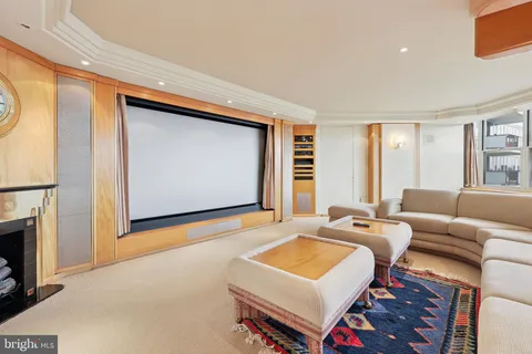 a living room with furniture and window