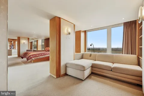a hallway with a book shelf