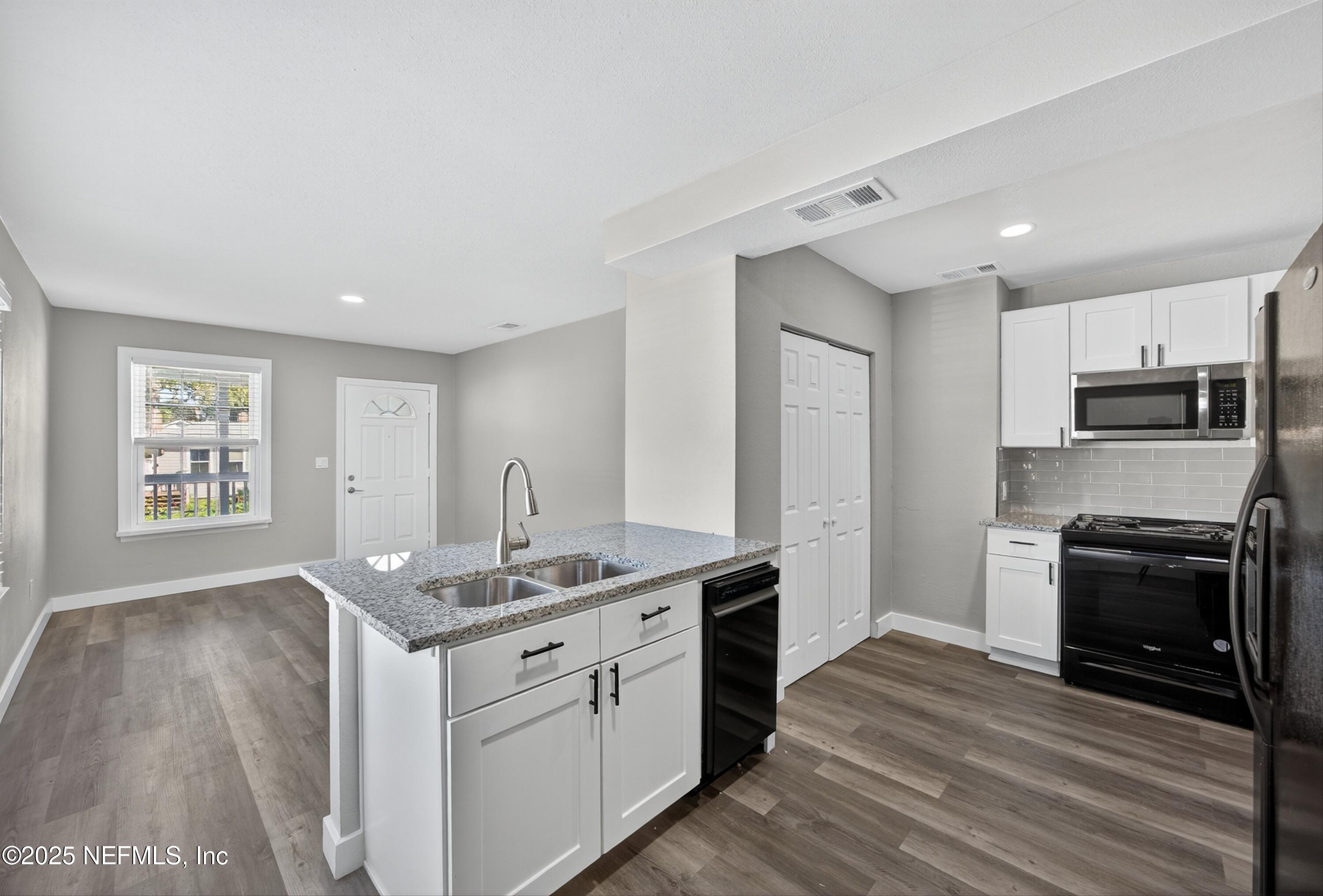 5202 Birkenhead Road Jacksonville, FL 32210 - Photo 7 of 42 Remodeled Kitchen with new cabinets