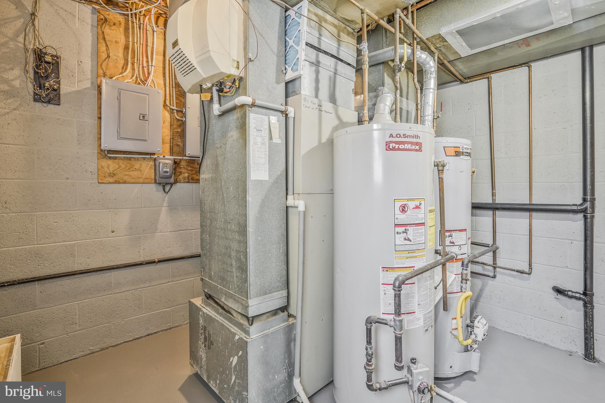 706 North Cleveland Street Arlington, VA 22201 - Photo 45 of 59 a utility room with dryer and washer