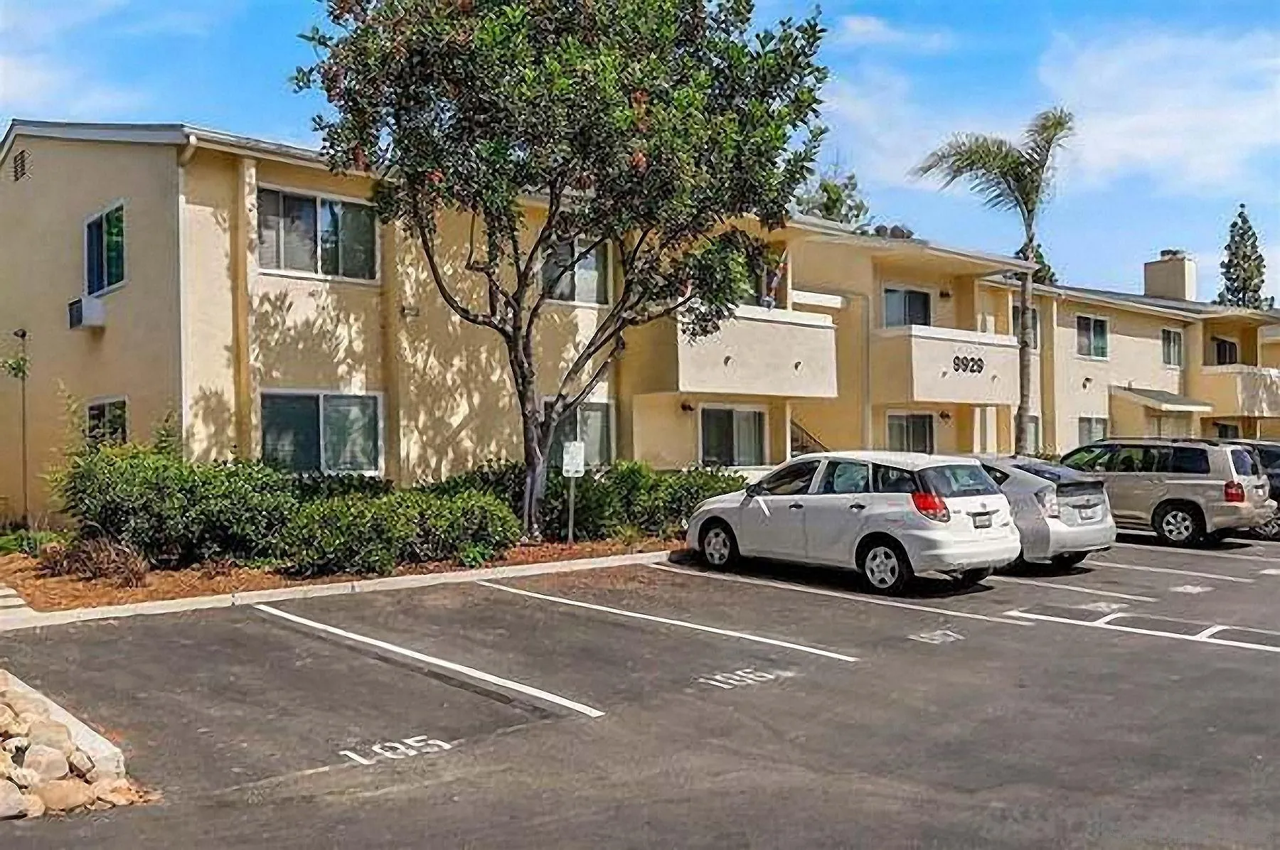 9929 Erma Road, Unit 102 San Diego, CA 92131 - Photo 13 of 14 a view of street with parked cars