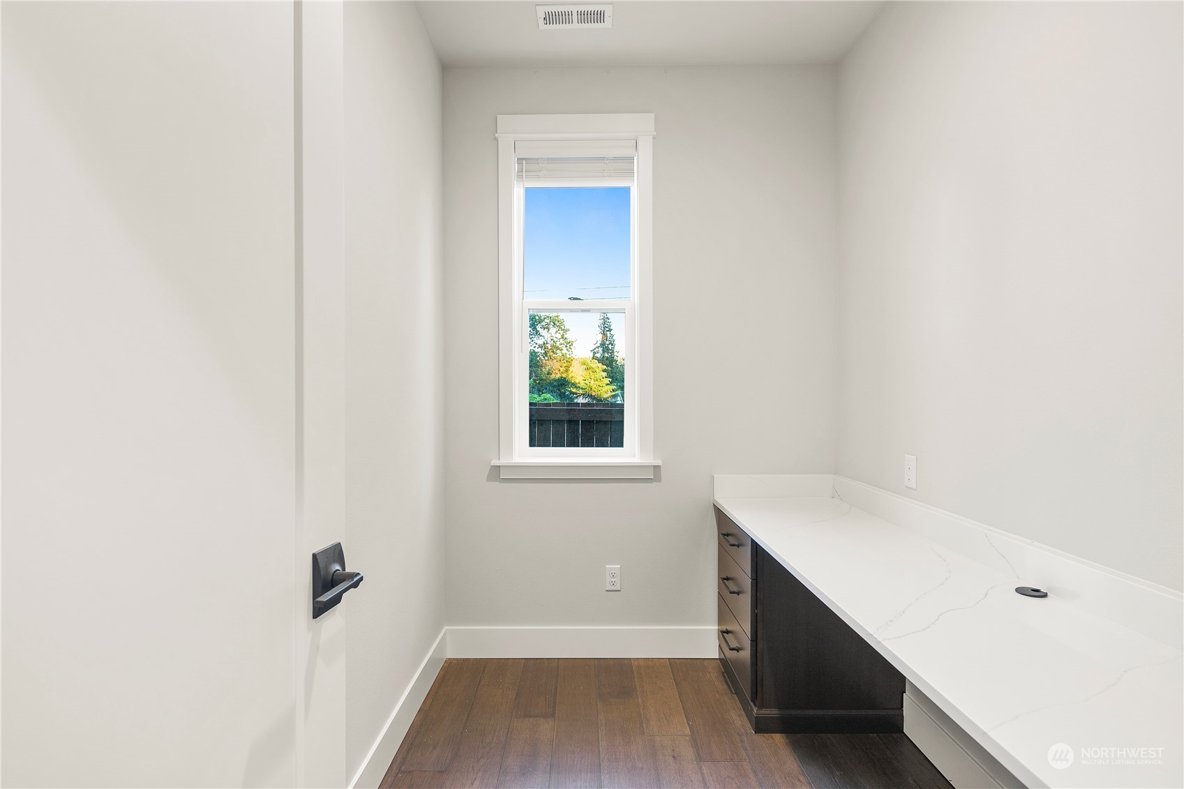 1302 197th Place Southeast Bothell, WA 98012 - Photo 15 of 35 a bathroom with a sink and a window