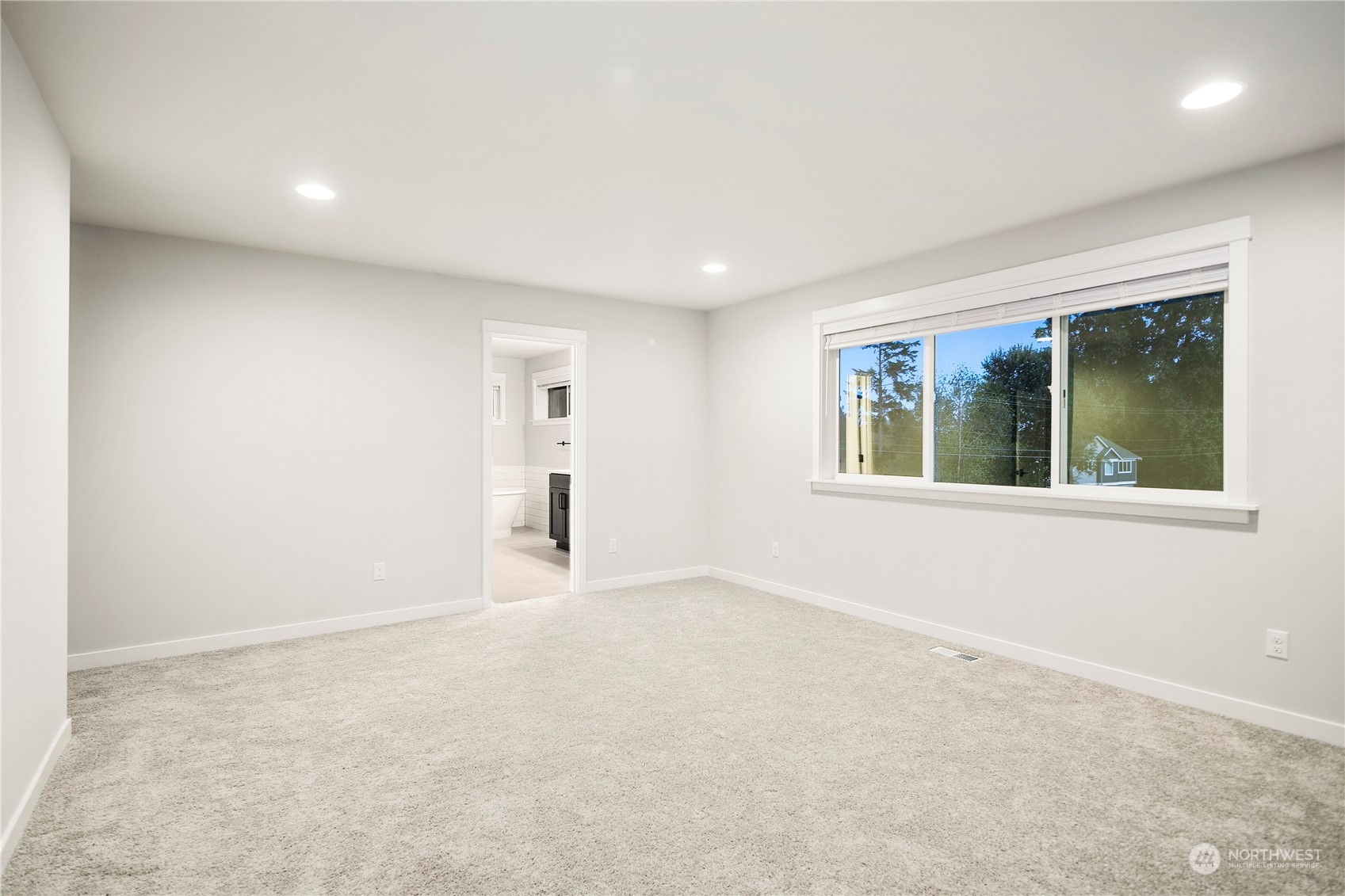 1302 197th Place Southeast Bothell, WA 98012 - Photo 21 of 35 an empty room with windows