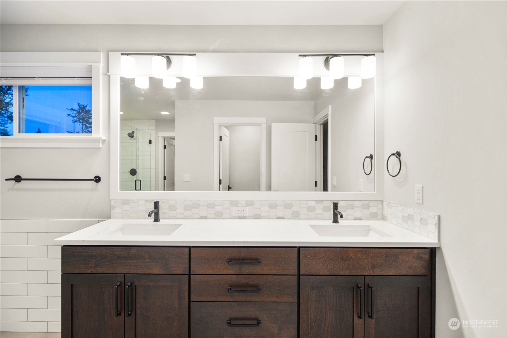 1302 197th Place Southeast Bothell, WA 98012 - Photo 24 of 35 a bathroom with a sink double vanity and a mirror