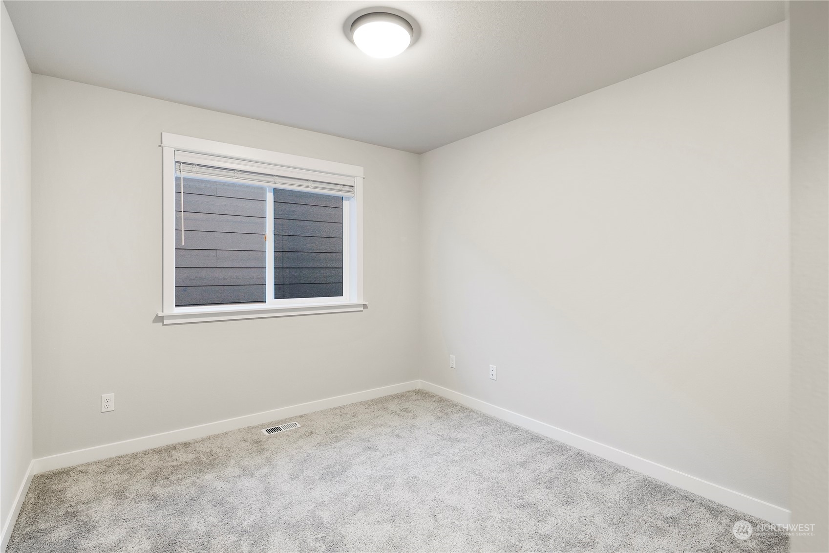 1302 197th Place Southeast Bothell, WA 98012 - Photo 31 of 35 an empty room with a window