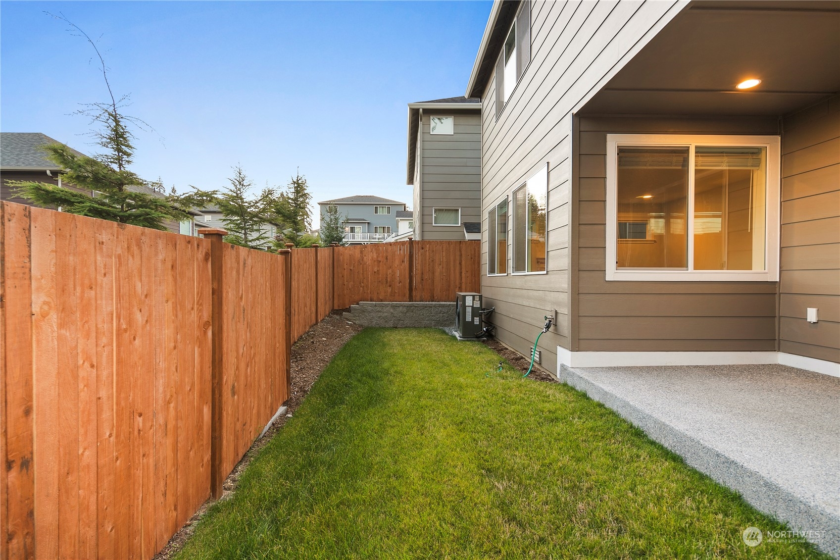 1302 197th Place Southeast Bothell, WA 98012 - Photo 34 of 35 a view of an house with backyard and garden