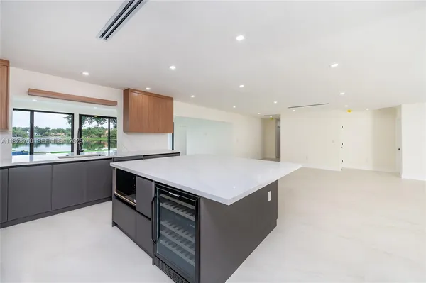 a kitchen with a stove and a refrigerator