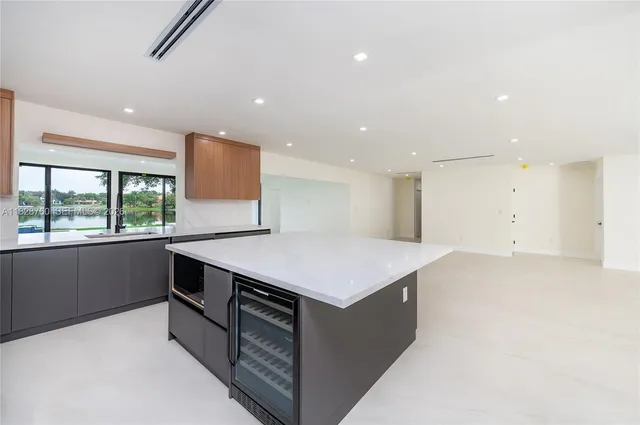 a kitchen with a stove and a refrigerator