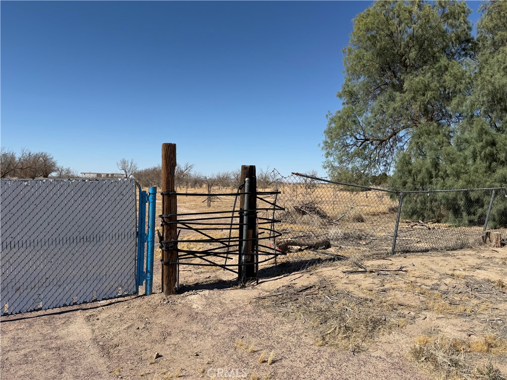 41854 Silver Valley Road Newberry Springs, CA 92365 - Photo 2 of 18 a view of a pathway of a building