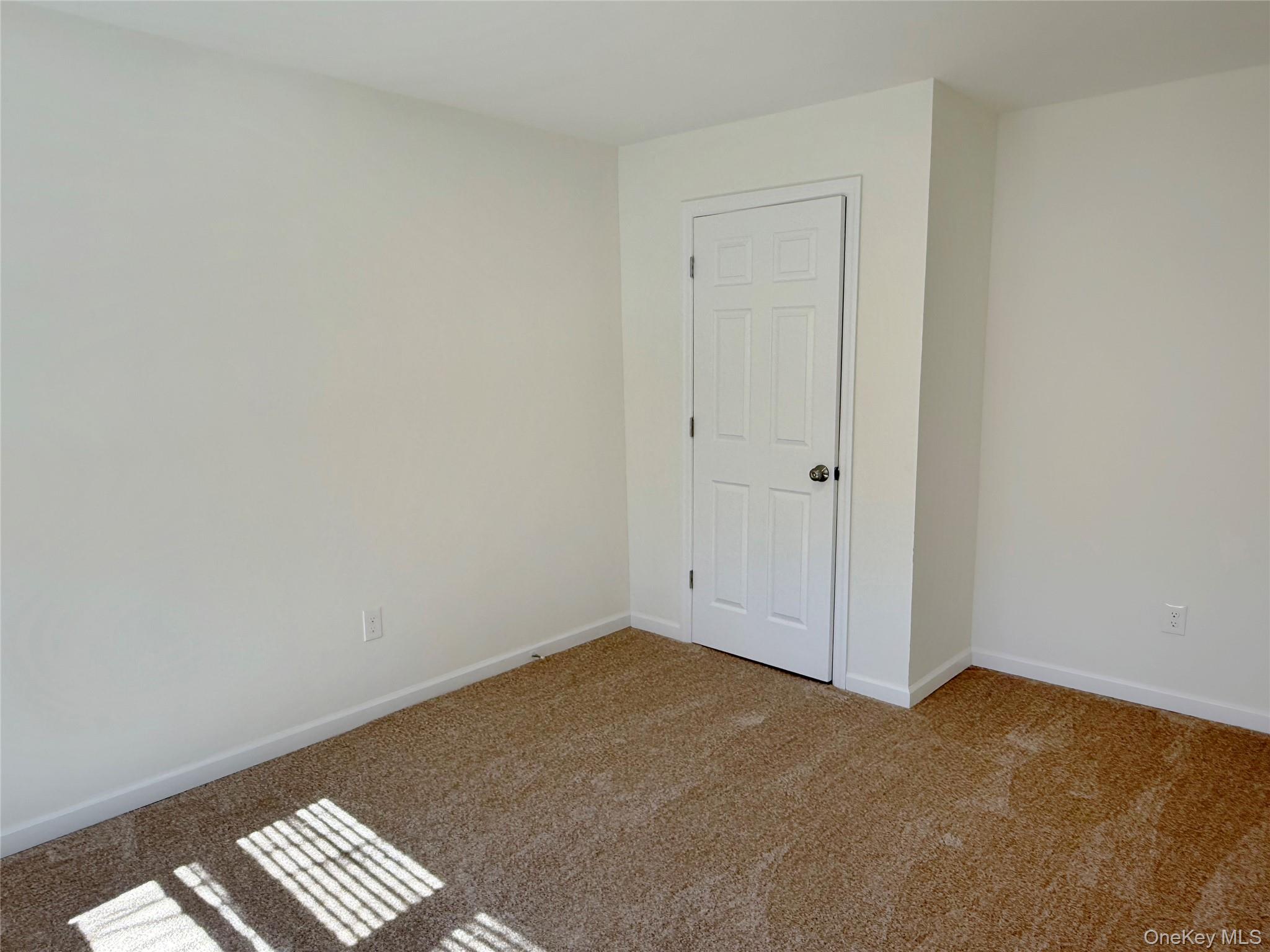 225 Fir Grove Road Ronkonkoma, NY 11779 - Photo 12 of 22 a view of room with window