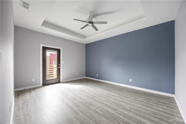 a view of an empty walk in closet