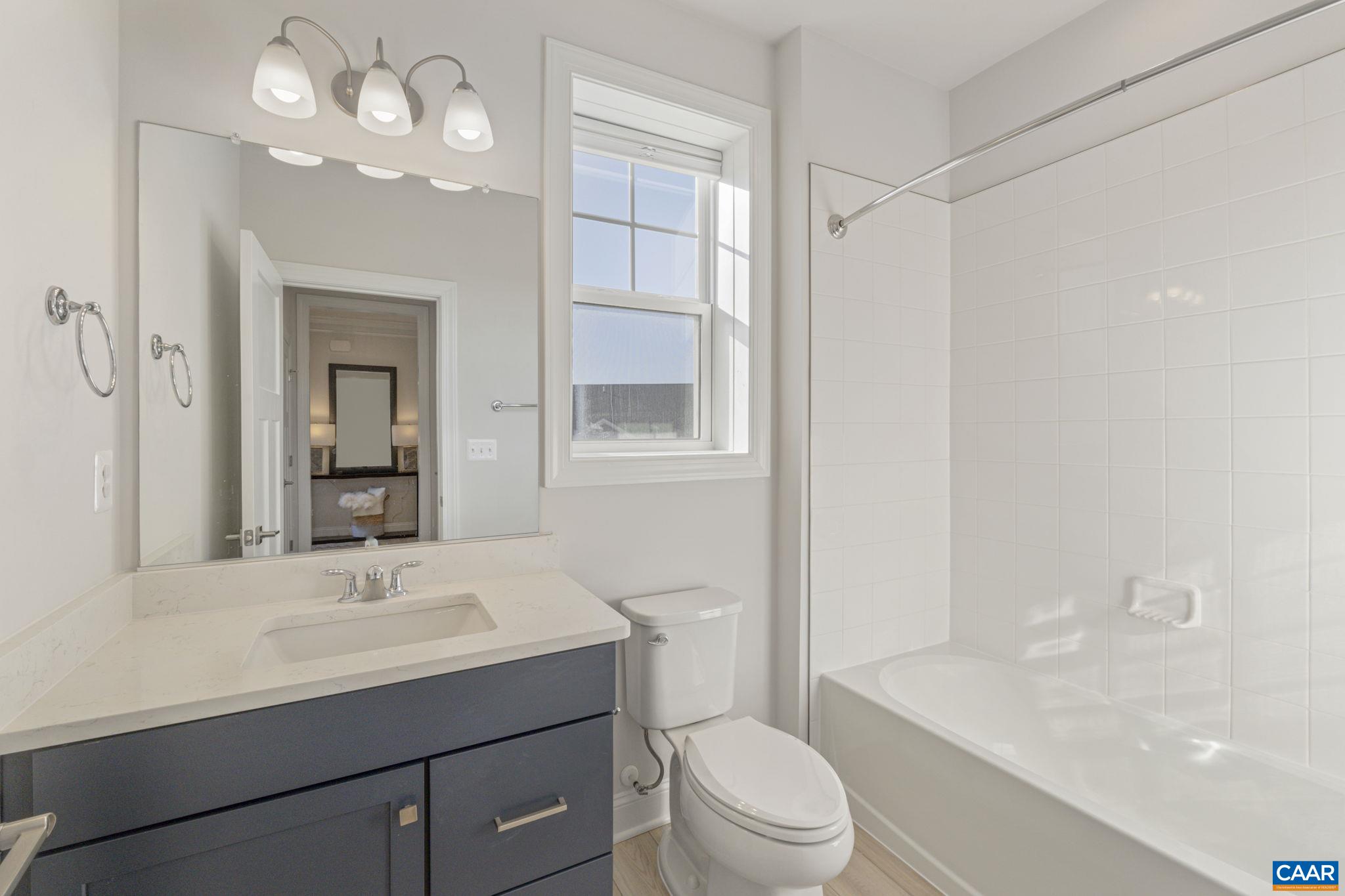 62 C Springdale Road Waynesboro, VA 22980 - Photo 7 of 13 a bathroom with a sink a toilet and shower
