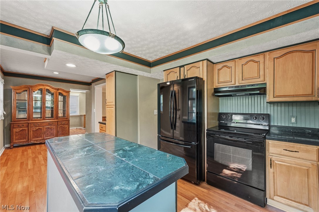 6832 Hillside Road Independence, OH 44131 - Photo 15 of 44 Kitchen with view into breakfast area and beyond to office space