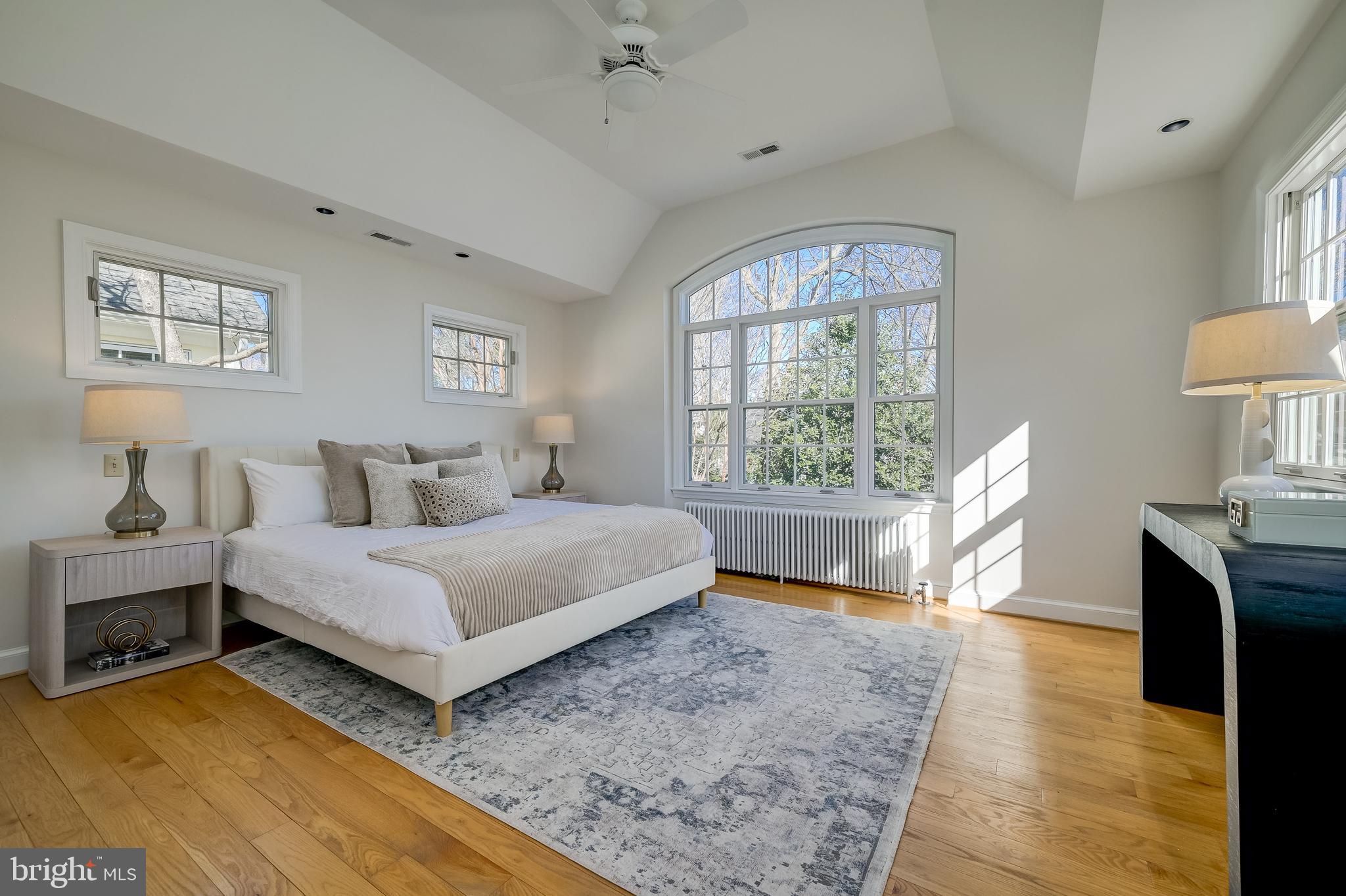 7817 Stratford Road Bethesda, MD 20814 - Photo 21 of 38 a spacious bedroom with a bed and a window