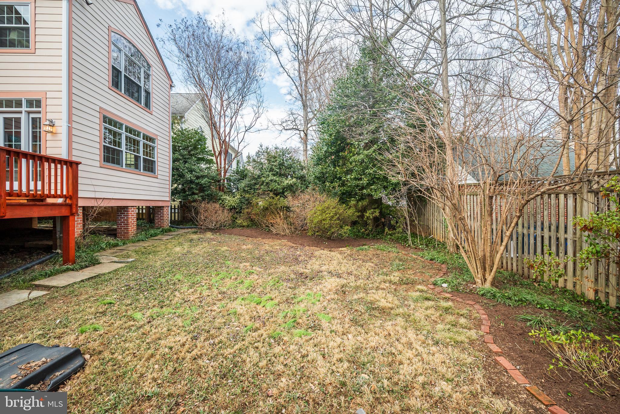 7817 Stratford Road Bethesda, MD 20814 - Photo 37 of 38 a view of a house with a yard and sitting area