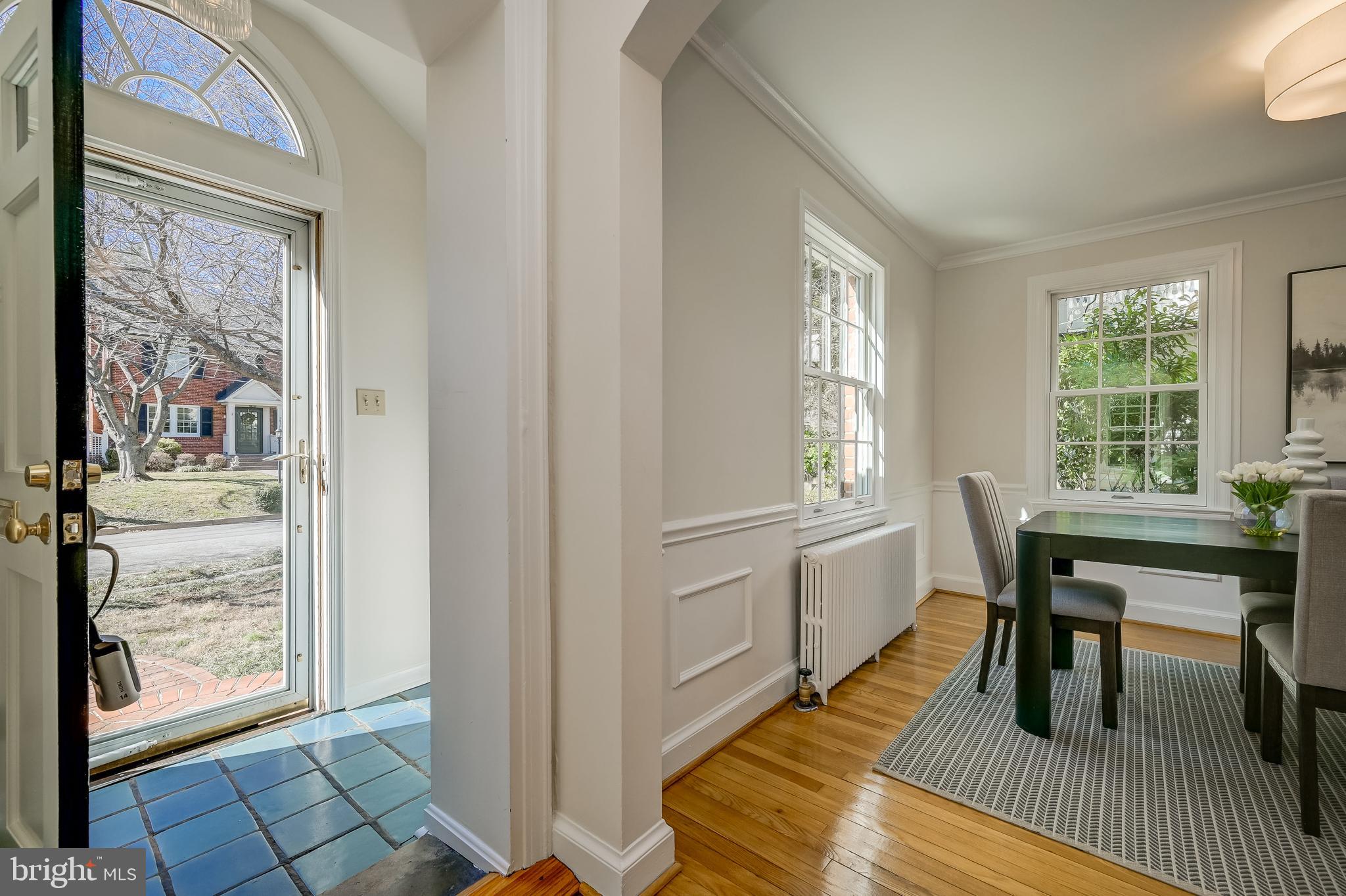 7817 Stratford Road Bethesda, MD 20814 - Photo 4 of 38 a view of a dining room with furniture window and wooden floor