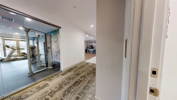a view of a living room and dining room