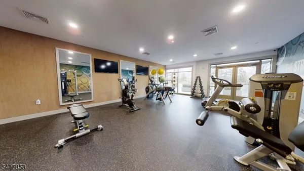 a view of a room with gym equipment