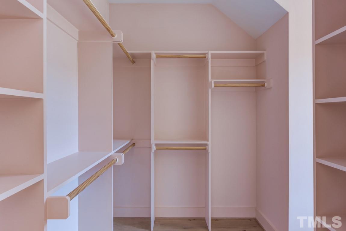 612 Shelley Road Raleigh, NC 27609 - Photo 14 of 19 a view of an empty walk in closet