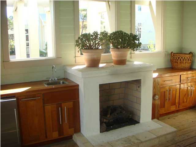 6 Mistflower Lane Santa Rosa Beach, FL 32459 - Photo 4 of 11 a kitchen with a sink and cabinets