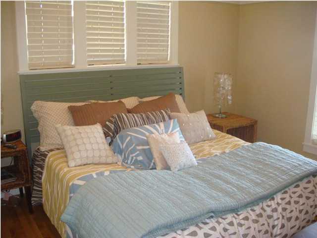 6 Mistflower Lane Santa Rosa Beach, FL 32459 - Photo 10 of 11 a bedroom with a bed and wooden floor