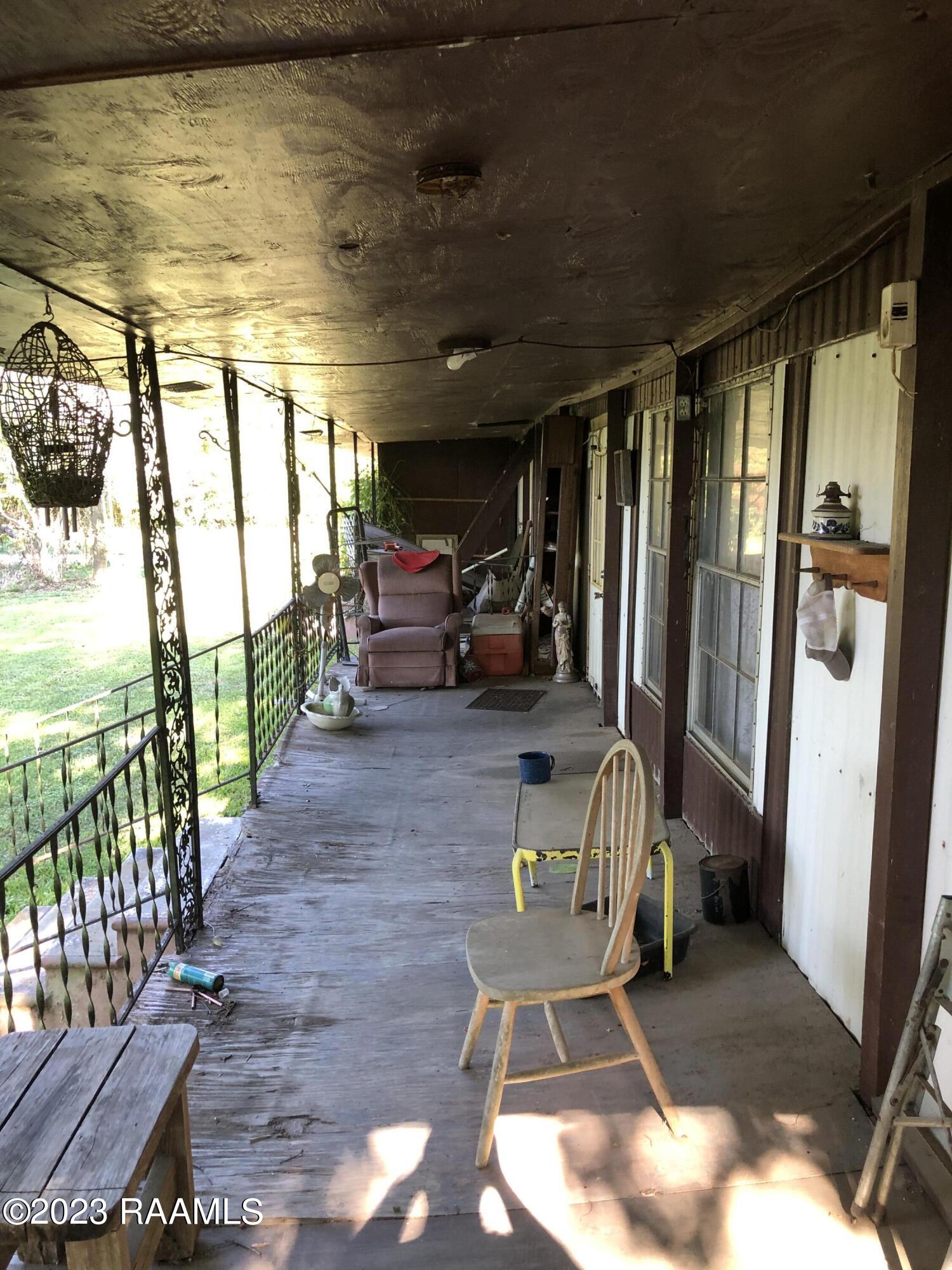 108 Facade Road Carencro, LA 70520 - Photo 4 of 39 Covered Porch 1