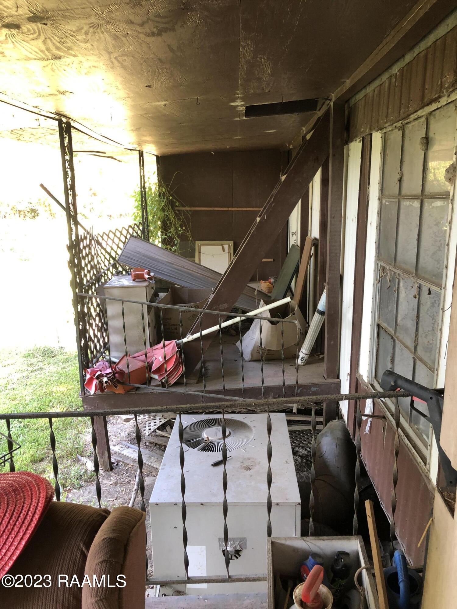 108 Facade Road Carencro, LA 70520 - Photo 5 of 39 Covered Porch 2