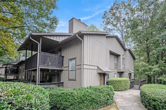 a front view of a house with garage