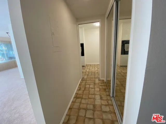 a view of empty room with a window