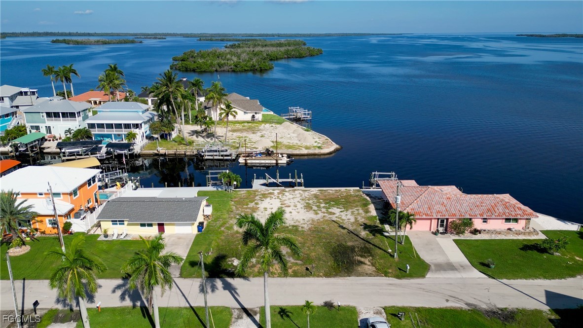 2864 Triggerfish Street Matlacha, FL 33993 - Photo 8 of 11 an aerial view of a house with a yard