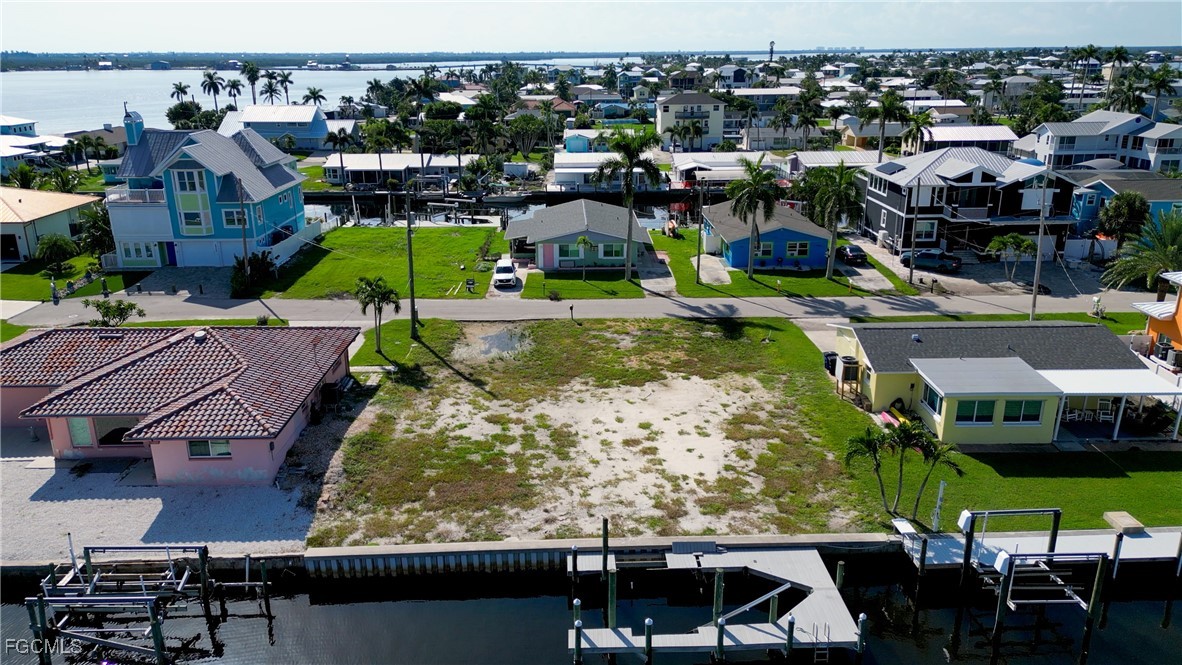 2864 Triggerfish Street Matlacha, FL 33993 - Photo 9 of 10 a view of multiple houses with outdoor space